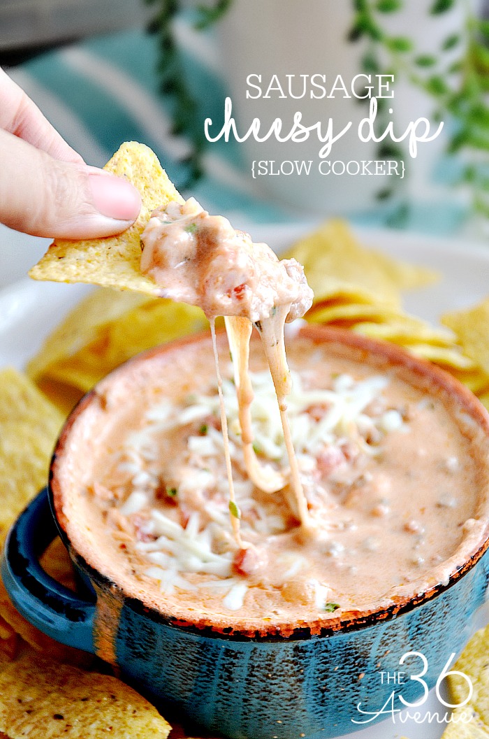Cheese Sausage Dip Recipe - This easy slow cooker dip recipe is the perfect appetizer for any party. We love to serve it with tortilla chips or crackers.  An easy slow cooker recipe that you want to pin for later! 