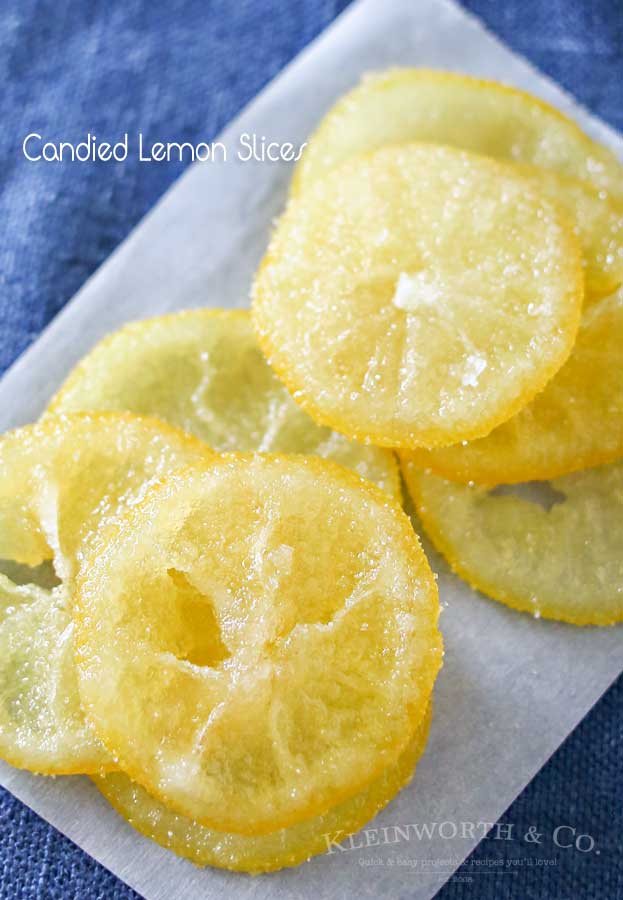 Beautiful Candied Lemon Slices are perfect for topping on pastries, cupcakes, drinks & more spring treats! Easy recipe & a great way to use those lemons. Plus you can use all the leftover lemon simple syrup to add to all your favorite drinks later. Don't miss how I use it as the key ingredient in my most popular recipe here on Kleinworth & Co.
