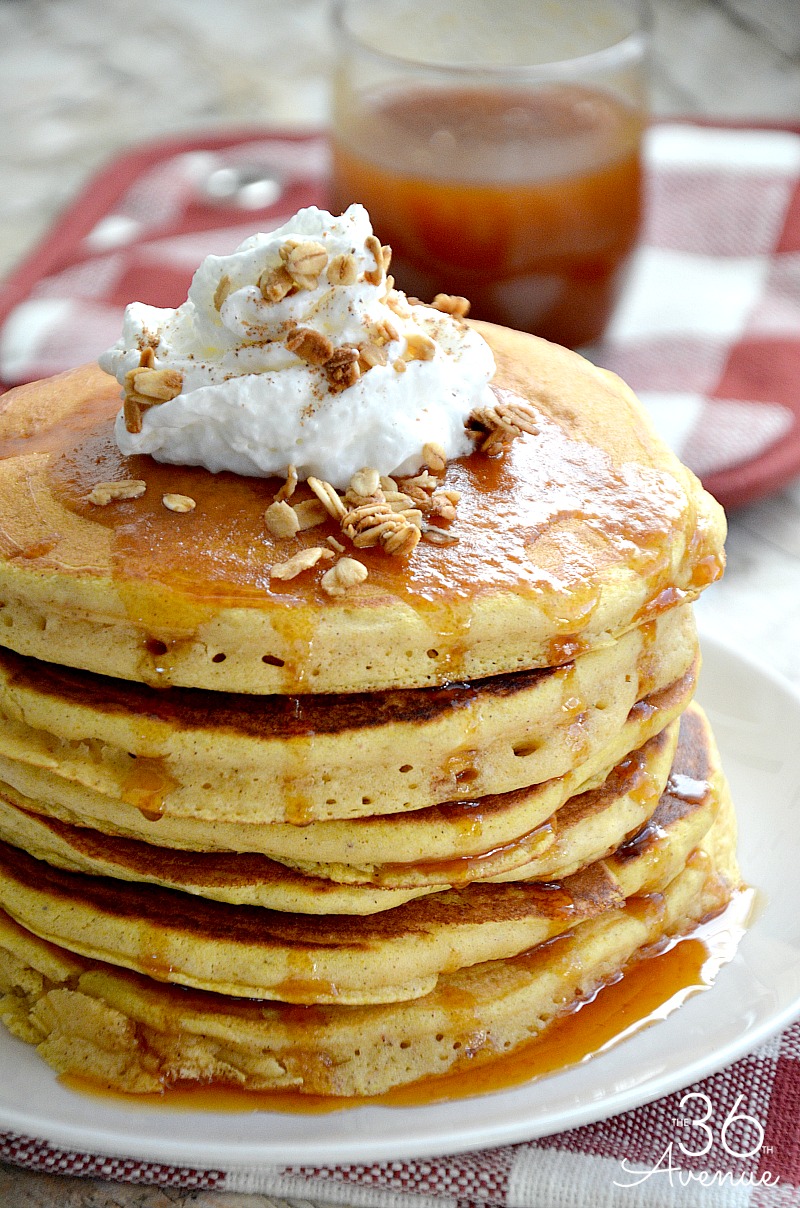 Fall Recipes - Delicious and easy homemade pumpkin pancakes and pumpkin syrup. These pancakes make the perfect Fall breakfast.