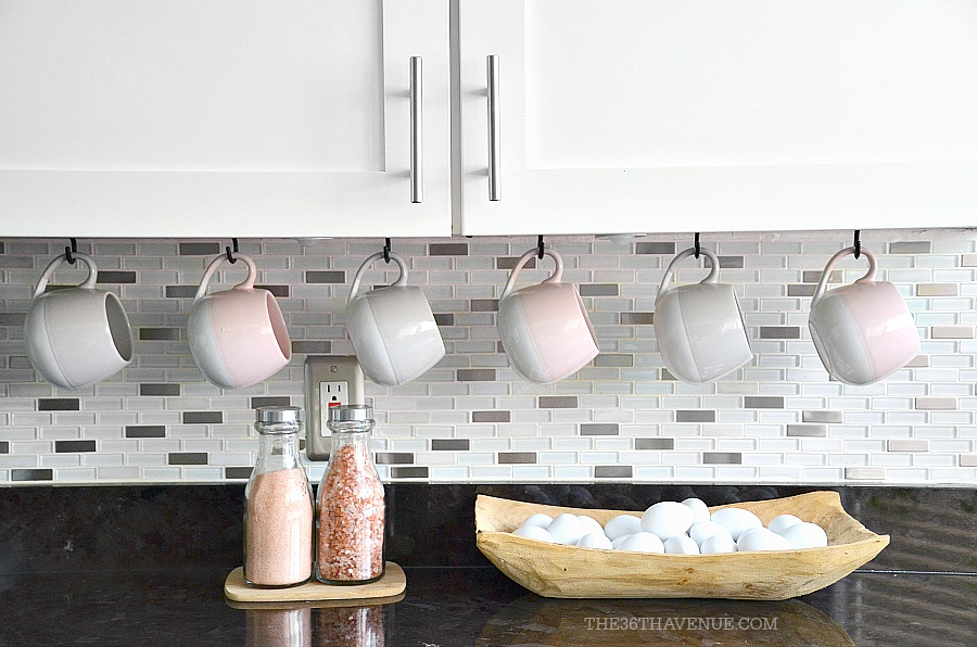 White kitchen decor ideas and how to decorate with pink accents. 